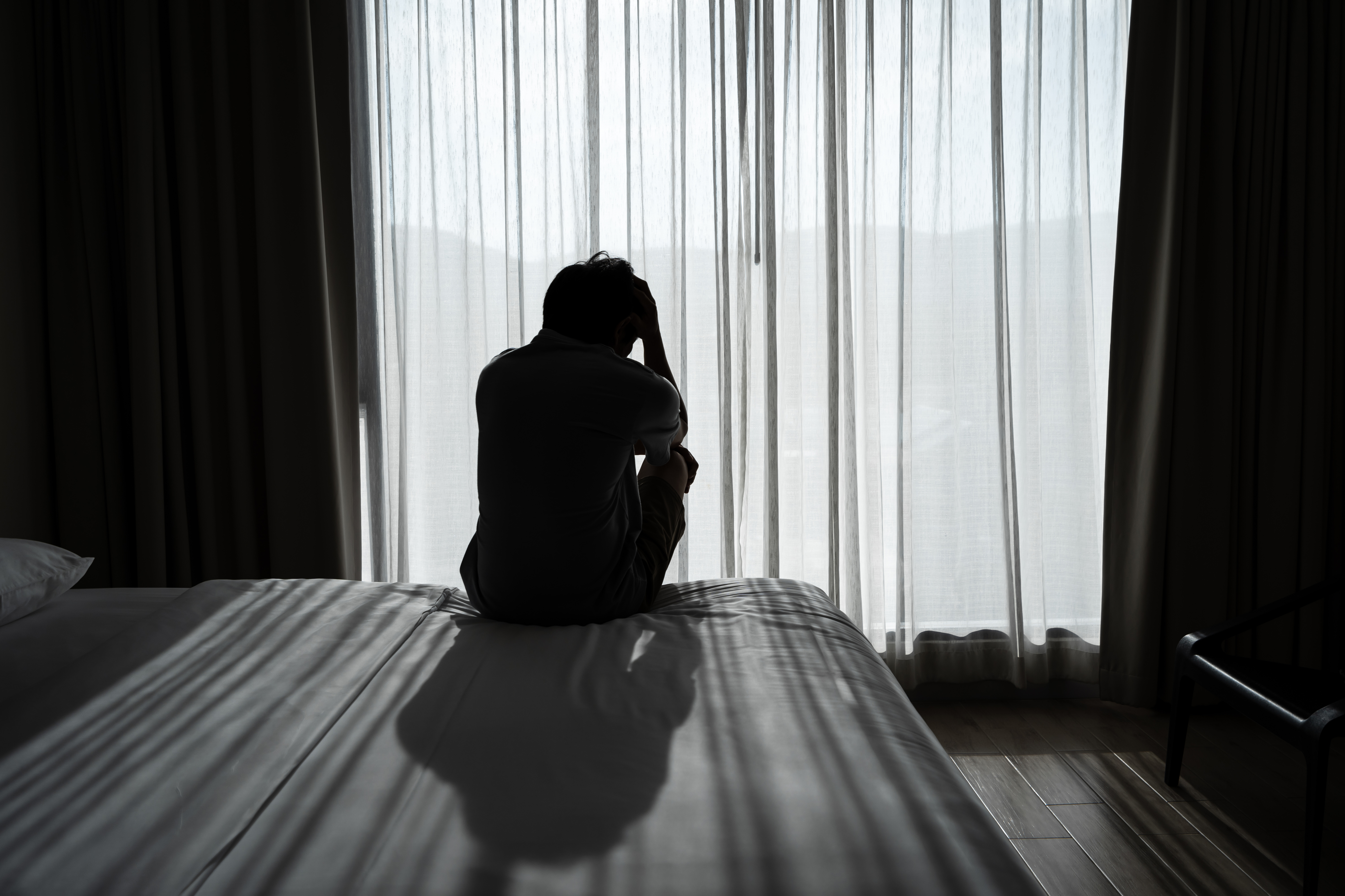 lonely-young-man-feeling-depressed-and-stressed-si-2022-06-07-08-20-26-utc-63ecfc3398a04159798403.jpg